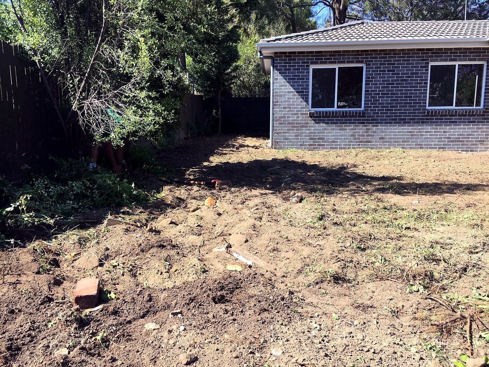 Kellyville backyard during surface clearing and excavation before turf preparation