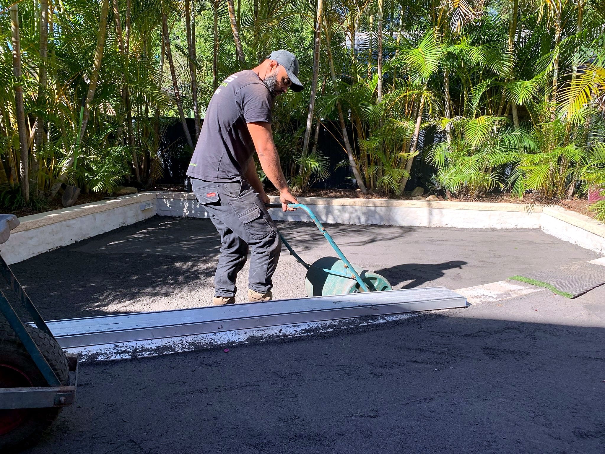 Soil base being levelled beside the curved garden edge in Mona Vale