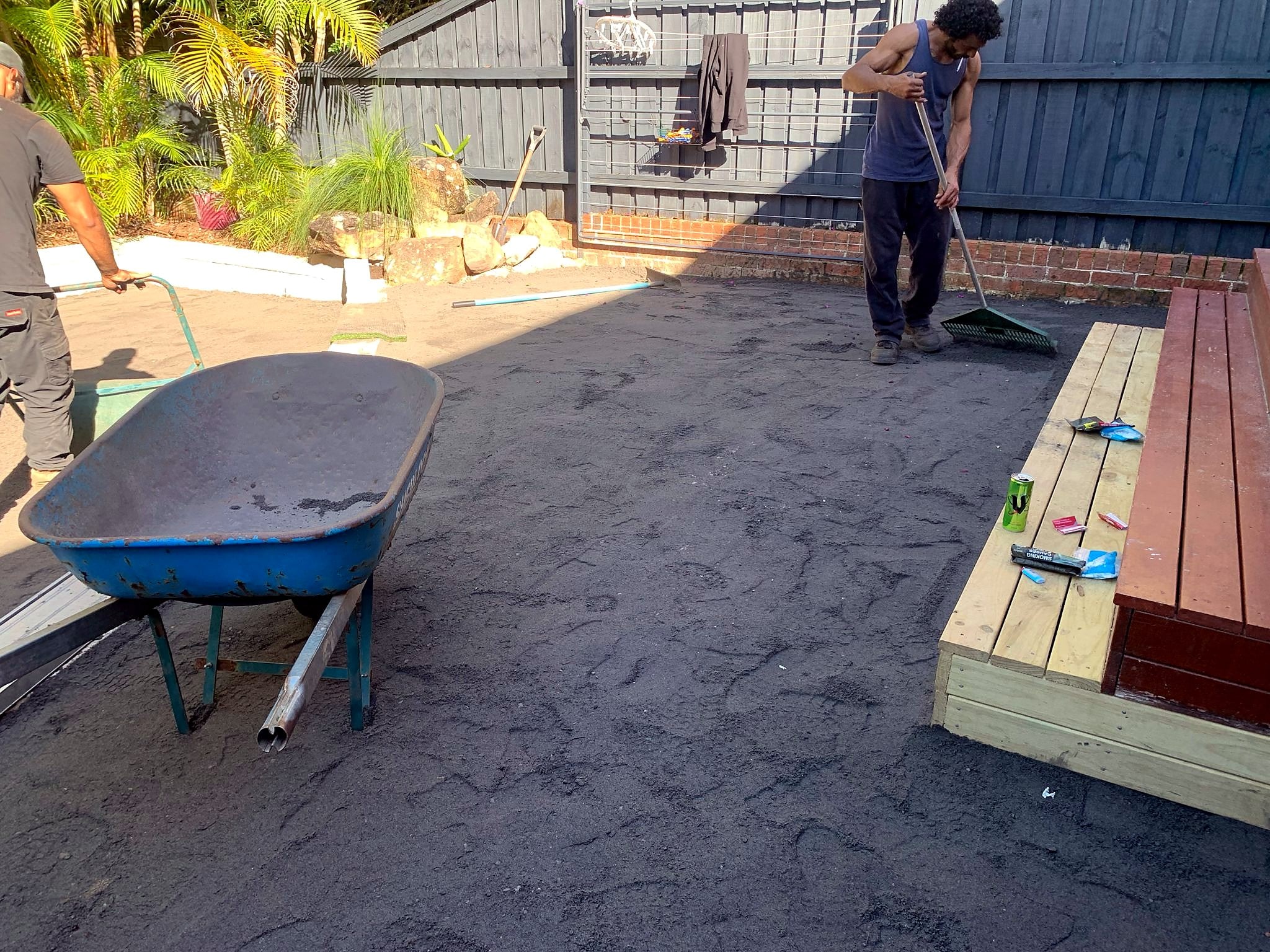 Mona Vale lawn area during final soil preparation beside the timber deck