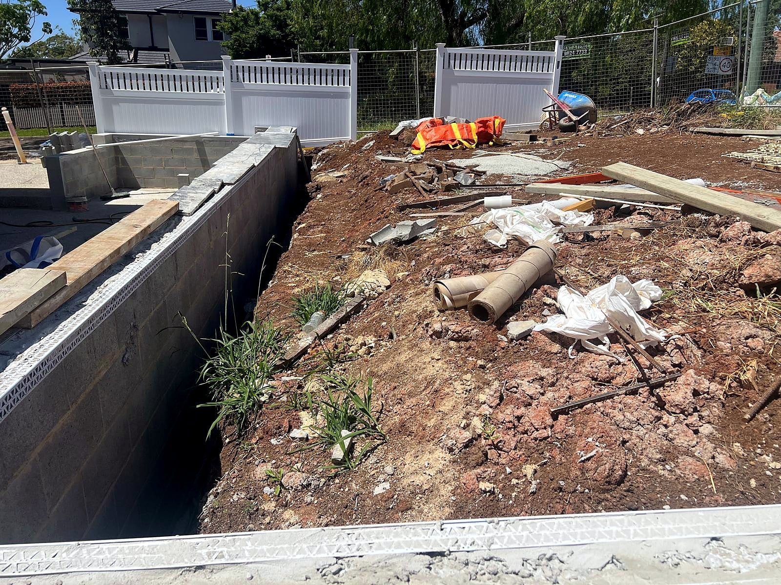 Front lawn preparation beside the boundary fence in Turramurra